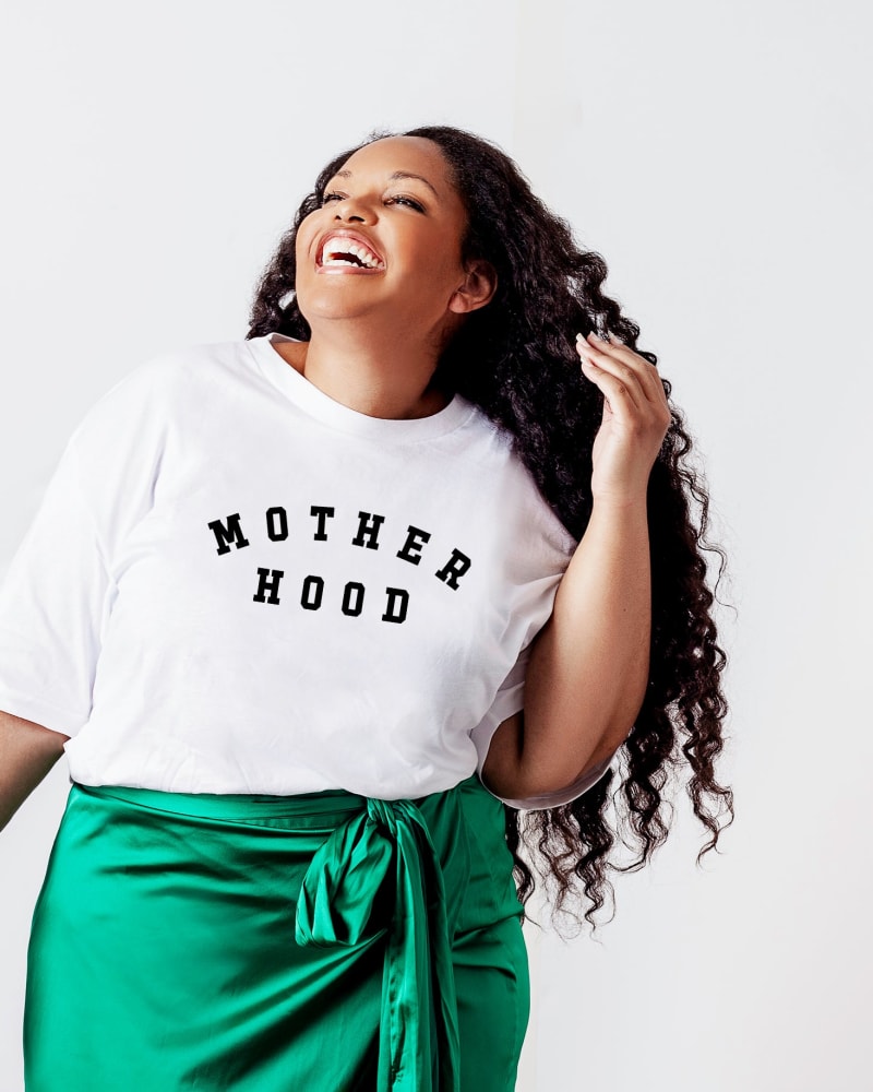 Front of a model wearing a size 2XL Motherhood in White by Simply Sage Market. | dia_product_style_image_id:281701